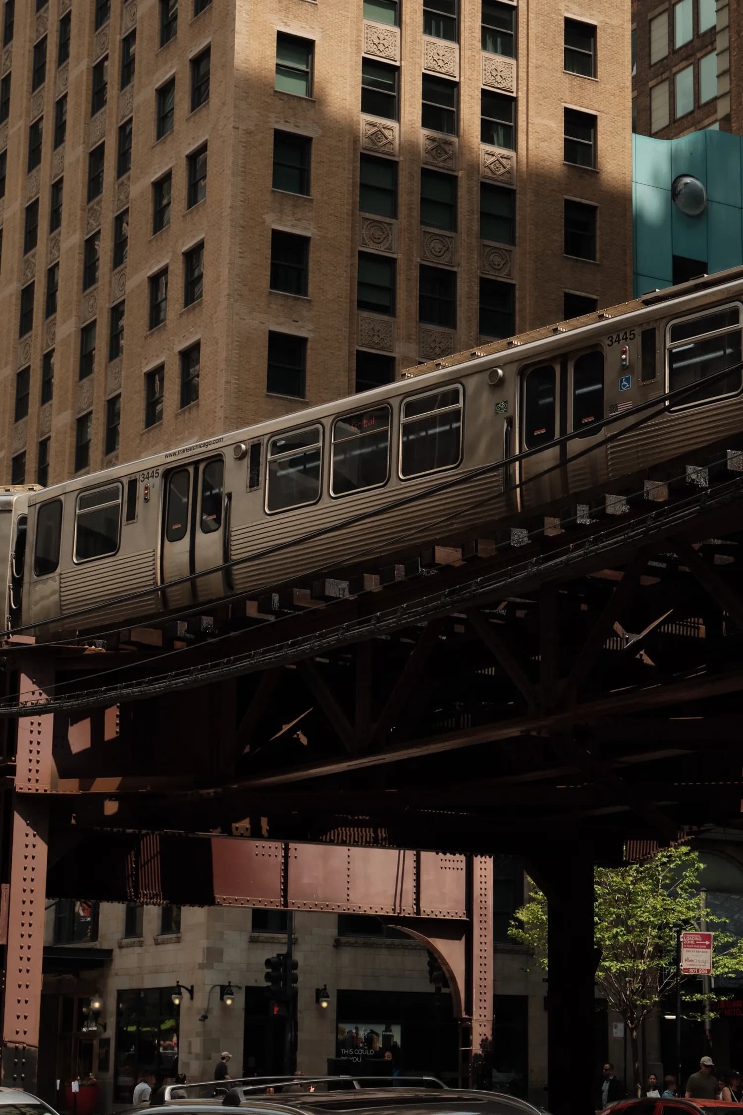 An elevated train moving through downtown Chicago